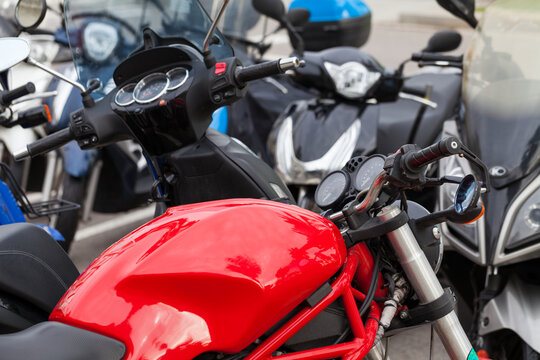 Picture of a modern motor motorbike parked in downtown