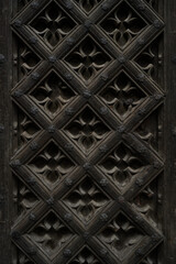 Seven-hundred-year-old entrance door to the basilica in Gdańsk. Carved door close-up.