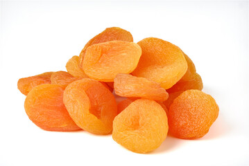 Heap of dried apricots isolated on white background