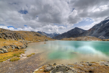 Alpine green lake. Wide angle of view.