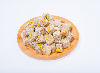 Turkish delight sweets on a wooden stand..