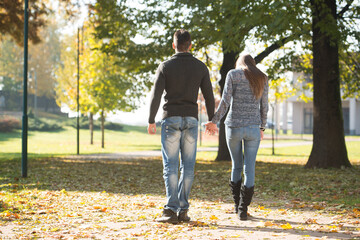 Couple In Autumn Park