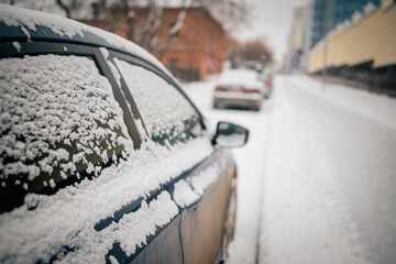 Snowy city with poor visibility, snowstorm on the street.