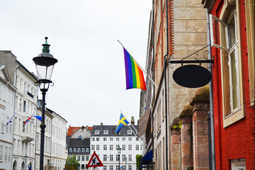 Rainbow LGBT flag on the building facade in Copenhagen, Denmark. Pride Week.
