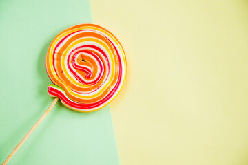 Colorful candies, lollypop on the colorful background
