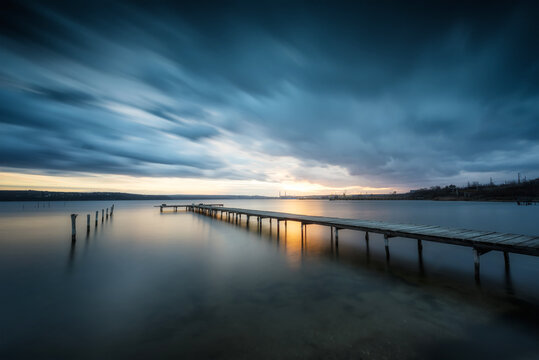 The last sunlight. Magnificent long exposure lake view after sunset.