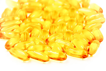 Omega-3 fish oil capsules on white background