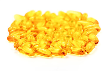 Omega-3 fish oil capsules on white background