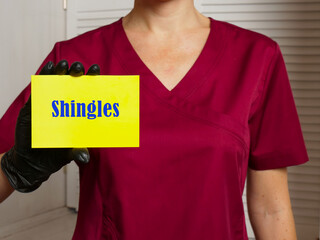  Shingles sign on the piece of paper.