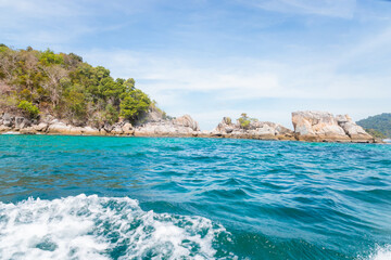 Fototapeta na wymiar Sea waves on the beautiful turquoise sea on the beaches of Koh Lipe in Thailand.