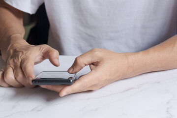 Man using smartphone search for business information.