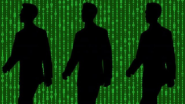 Silhouetted businessman against green code numbers
