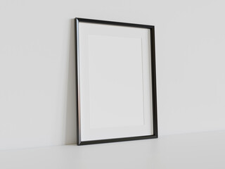 Black frame leaning on white floor in interior mockup. Template of a picture framed on a wall 3D rendering