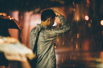 Man getting wet in the rain