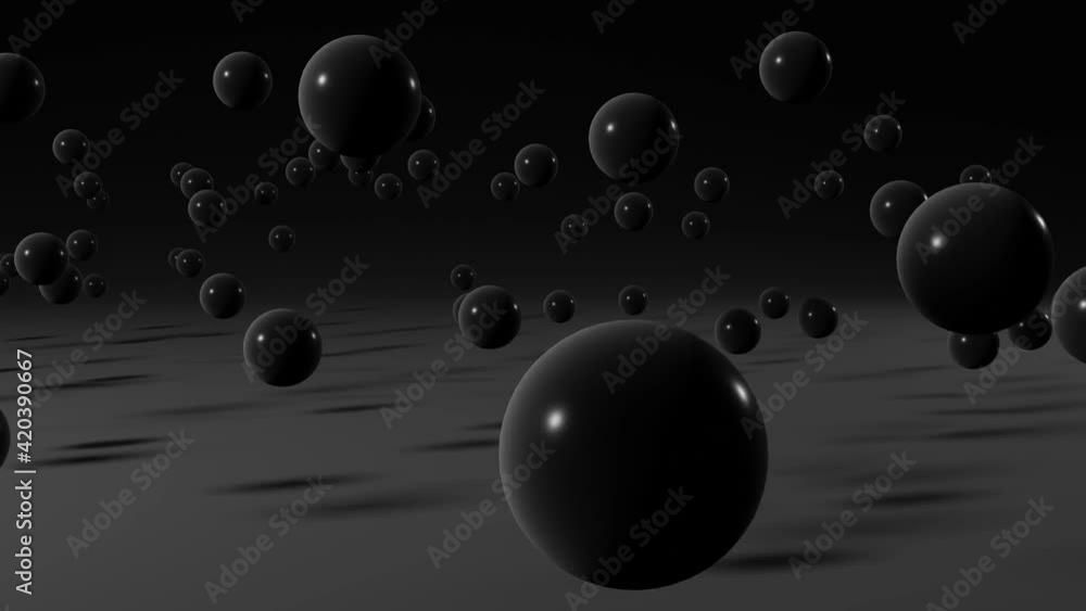 Poster black balls on a black background. simple motion graphic seamless loop animation