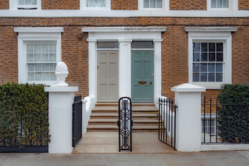 Front doors on typical street of British terraced houses 
