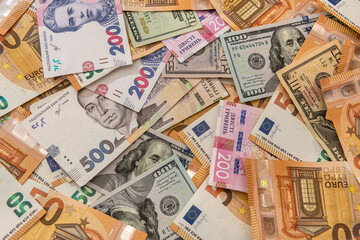 Money from different countries hryvnia, dollars and euros