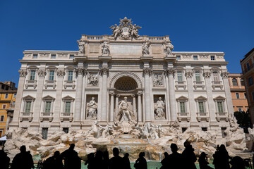 Fototapeta na wymiar Trevi Fountain and People Silhouette in Rome, Italy