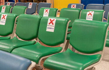 Obraz premium Social distancing or physical distancing is applied in the airport during this pandemic covid 19