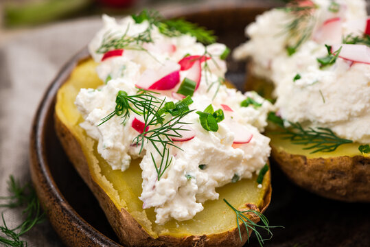 Jacked Potato with Cottage Cheese and Radish and Chive. Polish Traditional Pyry z Gzikiem Dish