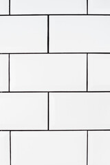 common vintage white ceramic tiles background, vertical photo