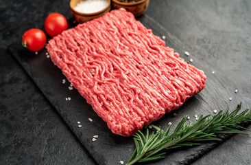 fresh minced meat on stone background