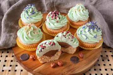 Obraz na płótnie Canvas Cupcakes with chocolate nuts and lavander