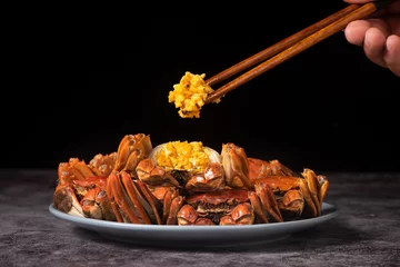 Fotobehang steamed chinese mitten crab, shanghai hairy crab with lots of crab roe © zhikun sun