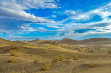 Fototapeta na wymiar Stunning view of the famous Varzaneh sand dunes in Iran
