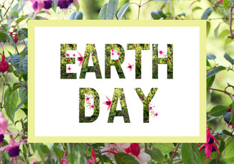 World earth day concept. Lettering Earth day with plants and wonderful flowers