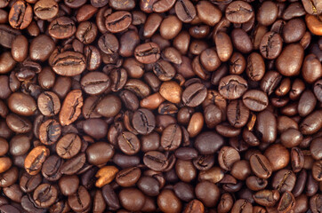 Roasted coffee beans background closeup