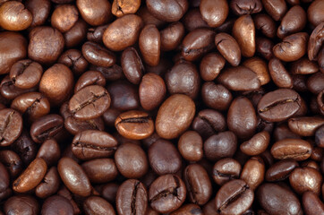 Roasted coffee beans background closeup