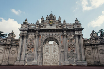 Entrance of Dolmabahce palace with sky at background, Istanbul, Turkey
