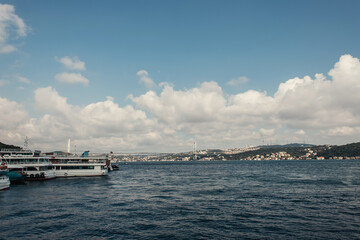 Fototapeta premium Ships and coast of Istanbul with sky at background, Turkey