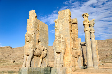 Ruins of majestic gates at Persepolis, the ancient capital of Persian empire, located near Shiraz in Iran - 420414028
