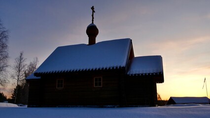 New wooden church on a cloudy winter day
