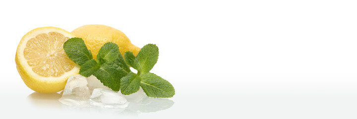 Fresh lemons, mint and ice on white background.