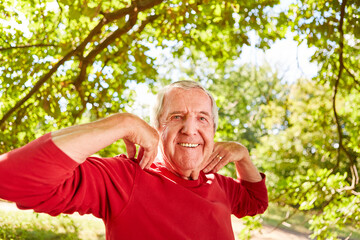 Happy senior is doing a breathing exercise