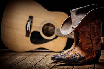 Country music festival live concert with acoustic guitar, cowboy hat and boots - obrazy, fototapety, plakaty