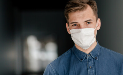 close up. thoughtful man in a protective mask.