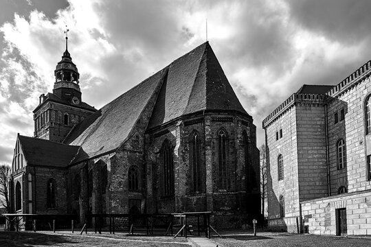 Medieval, gothic church with a belfry in Osno