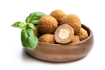 Mini scotch eggs in wooden bowl isolated on white