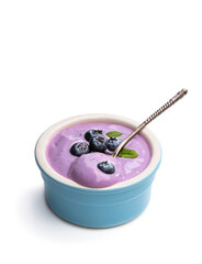 Fresh yoghurt with blueberry in ceramic bowl isolated on white