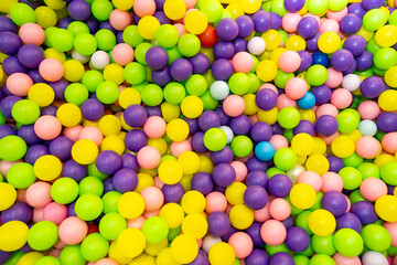 multi-colored plastic balls. dry pool in the children's entertainment room.