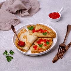 Fried crepes with red fish roe