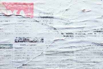 Different creased torn paper posters as background