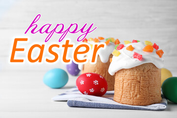 Happy holiday. Easter cakes and color eggs on white table