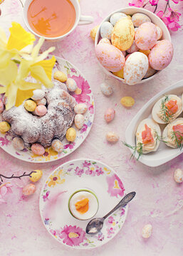 Easter breakfast.Cake and eggs on easter decorations