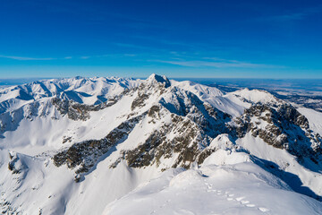 Fototapeta na wymiar Winter mountains in Tatra Mountains Zakopane, Poland - space for text