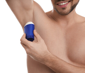 Naklejka premium Man applying deodorant isolated on white, closeup